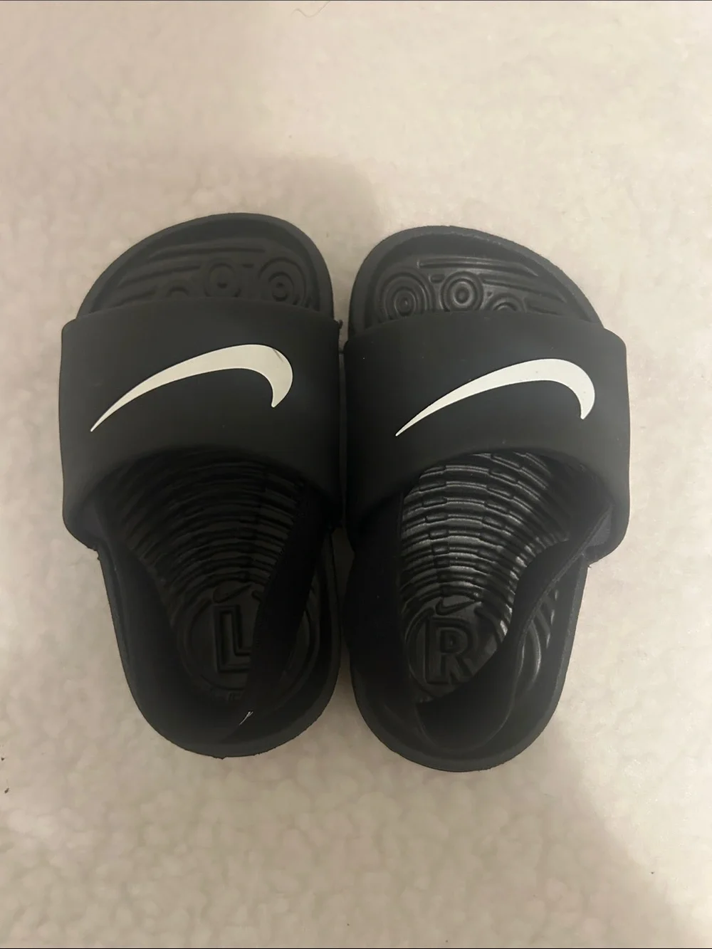 Nike Kids Black Slide Sandals with White Swoosh Accent